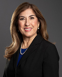 Nelly Trevino Santo, Presiding Judge and Director